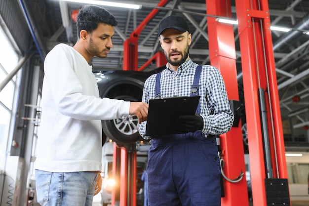 mechanic-car-service-is-talking-indian-car-owner-car-service-concept_255667-56455.jpg